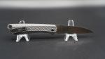 Product Description: The Slacker™ folding knife is his personal thought experiment realized: can an attractive, low-profile knife be built around Field Strip? The answer is resounding.</br></br>Field Strip – Disassemble your knife for cleaning without tools</br></br>Satin blade finish offers reduced cutting drag and improved corrosion resistance</br></br>Lightweight aluminum handles with a corrosion resistant coating</br></br>How Field Strip Works</br></br>Field Strip technology lets you easily disassemble your knife for cleaning without tools. To disassemble, close the knife, push the front release lever up. Then spin the rear release wheel clockwise—once you feel the handle release, pull it up and away. Handle and blade come apart easily. To bring the knife back together, place the blade and handle into the closed position—press and hold the pivot. Once the pivot is seated correctly, rotate the release wheel counter-clockwise until snug. Push front lever down. The knife is restored to full working order.</br></br>Specs</br></br>Blade Length</br>3.32" (84.43 mm)</br></br>Blade Edge</br>Plain</br></br>Blade Steel</br>1.4116</br></br>Blade Finish</br>Satin</br></br>Blade Thickness</br>0.11" (2.87 mm)</br></br>Overall Length</br>7.69" (195.28 mm)</br></br>Closed Length</br>4.31" (109.35 mm)</br></br>Weight</br>2.60 oz. (73.71g)</br></br>Handle</br>6061 Aluminum</br></br>Style</br>Folding Knife w/Liner Lock</br> CRKT K350KXP SLACKER